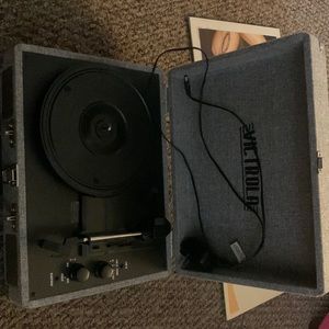 Victrola Turntable/Bluetooth speaker. Tim McGraw and Bruno Mars Record!